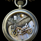 Illustration for article titled Enjoy These Clever Miniature Sculptures Made From Old Clock Parts